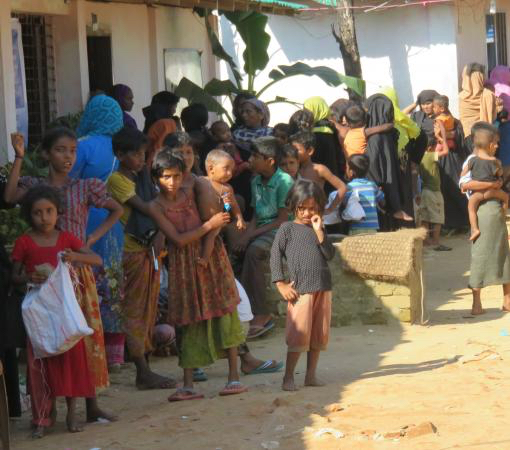 Rohingya children wait outside of an IOM medical clinic; photo taken by Dr. Zarni at the Kutupalong refugee camp in Bangladesh
